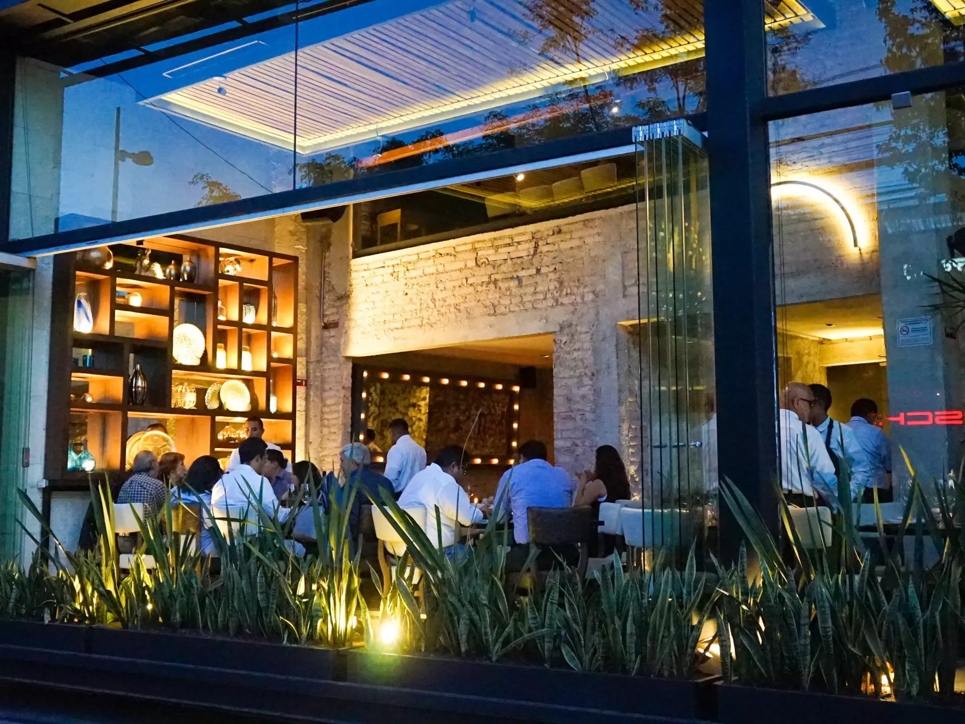 Open window of an upscale restaurant in Polanco in Mexico City, Mexico. Inspired By Maps/Shutterstock