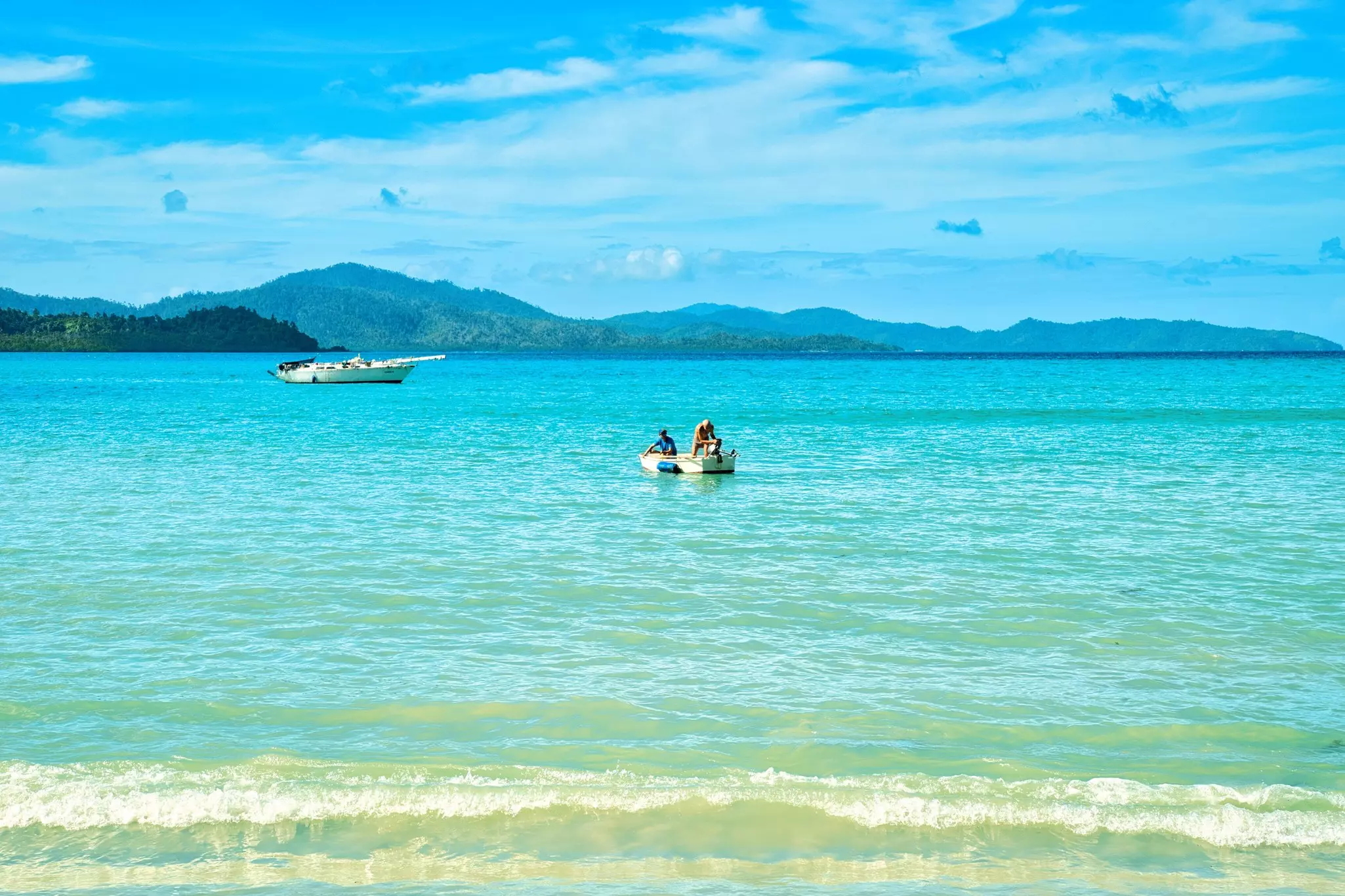 Beautiful coastline and turquoise water at the Port Barton Beach in Palawan