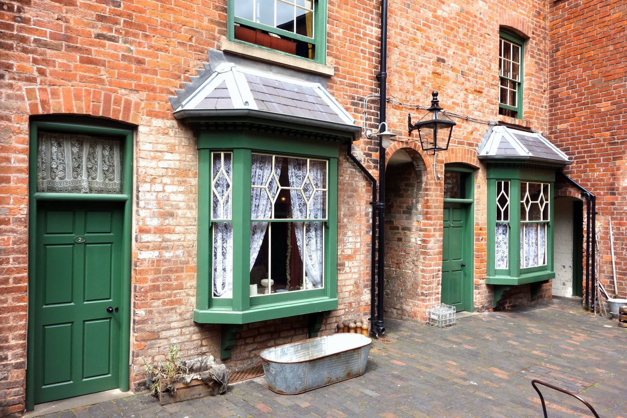 BIRMINGHAM, ENGLAND - JULY 4. The Birmingham Back-to-Backs are a block of Victorian dwellings which have been preserved and open to the public in the city centre. July 4 2016 in Birmingham, England.; Shutterstock ID 453993793; your: Bridget Brown;...