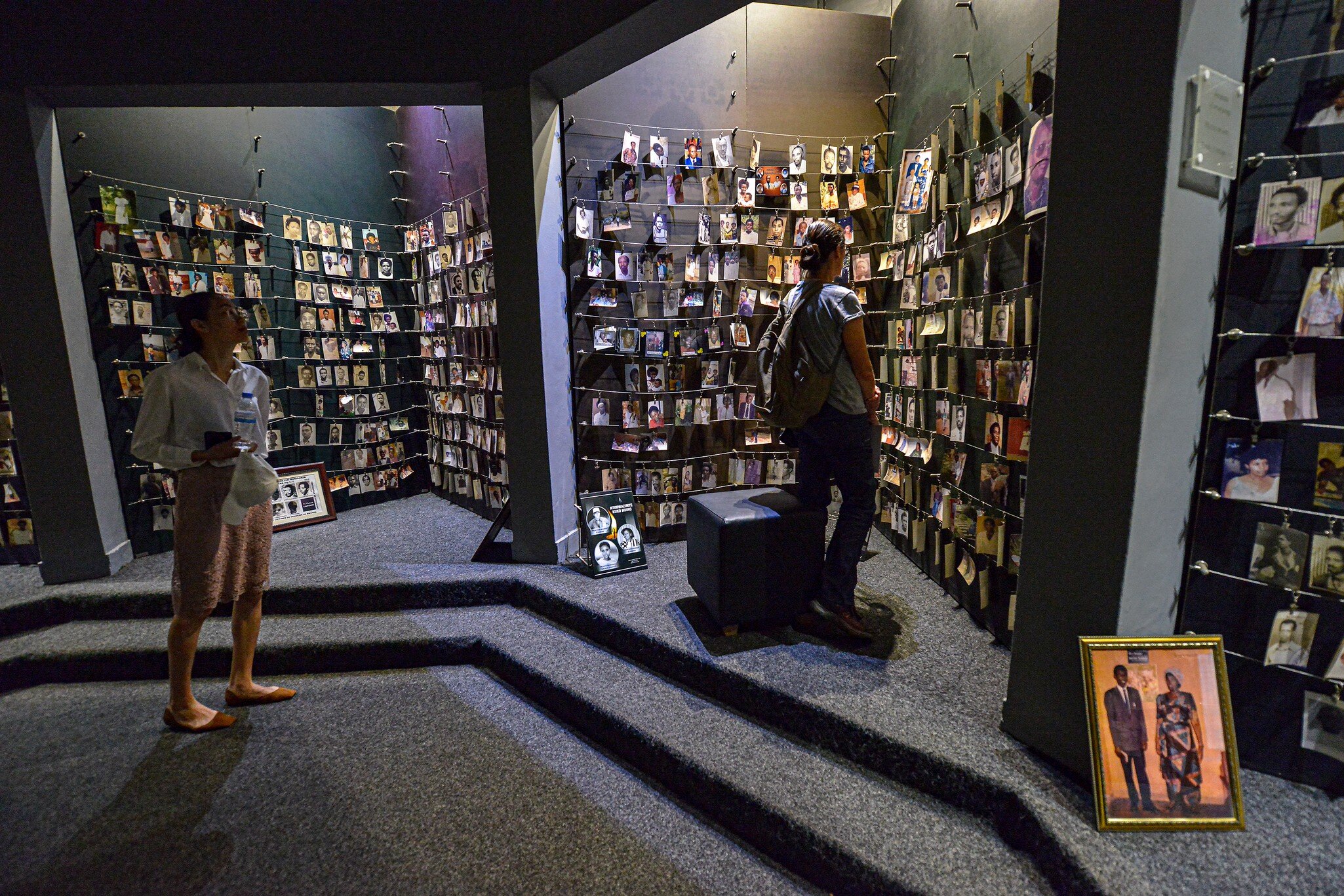 KIGALI, RWANDA - SEPTEMBER 2019: Tourists visiting the National Memorial to the victims of Genocide on September 25, 2019 in Kigali, Rwanda.