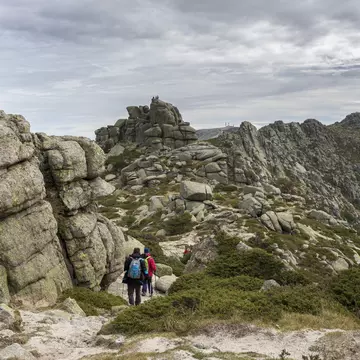 Hikers in Siete Picos range in Guadarrama Mountains National Park outside Madrid. Israel Hervas Bengochea/Shutterstock