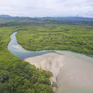 Aerial view of Playa Langosta, a beautiful white sand beach.