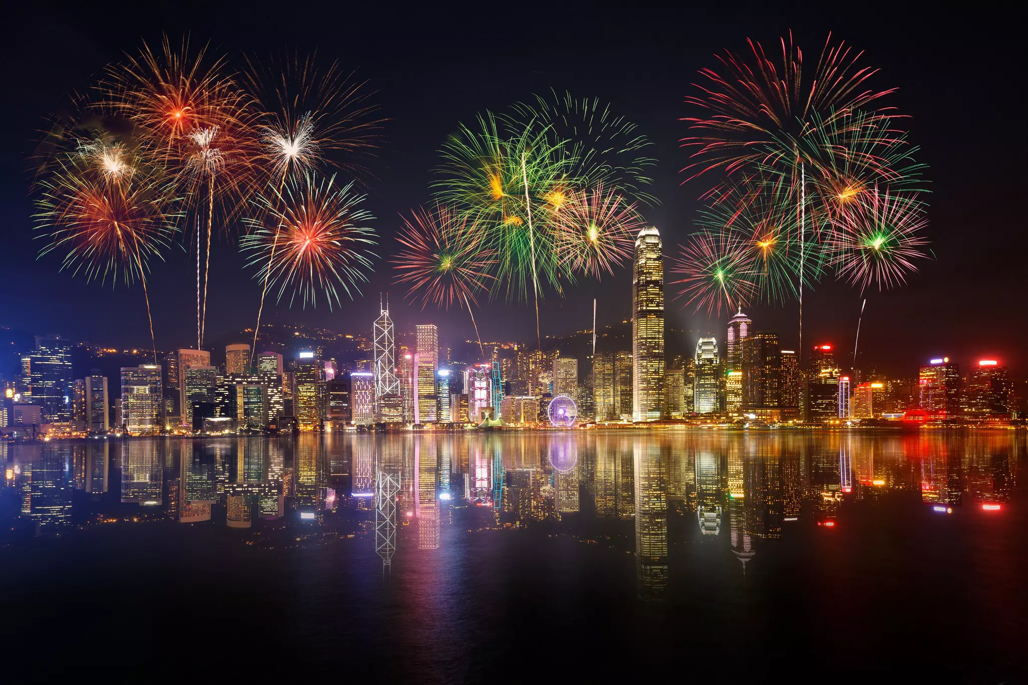 Night view and fireworks at Victoria Harbour, Hong Kong.