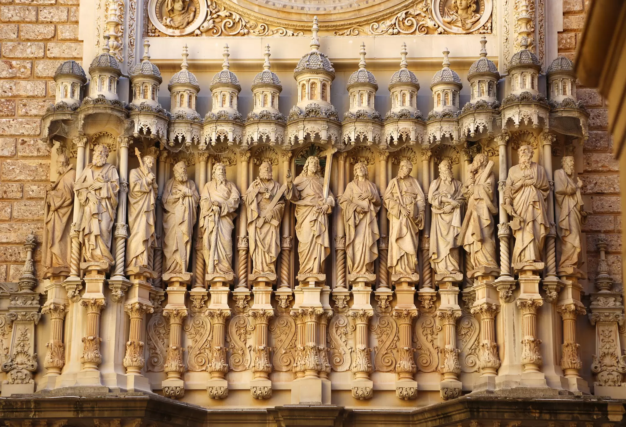 Carvings of Christ and the Twelve Apostles by the basilica at the Monestir de Montserrat near Barcelona, Spain.