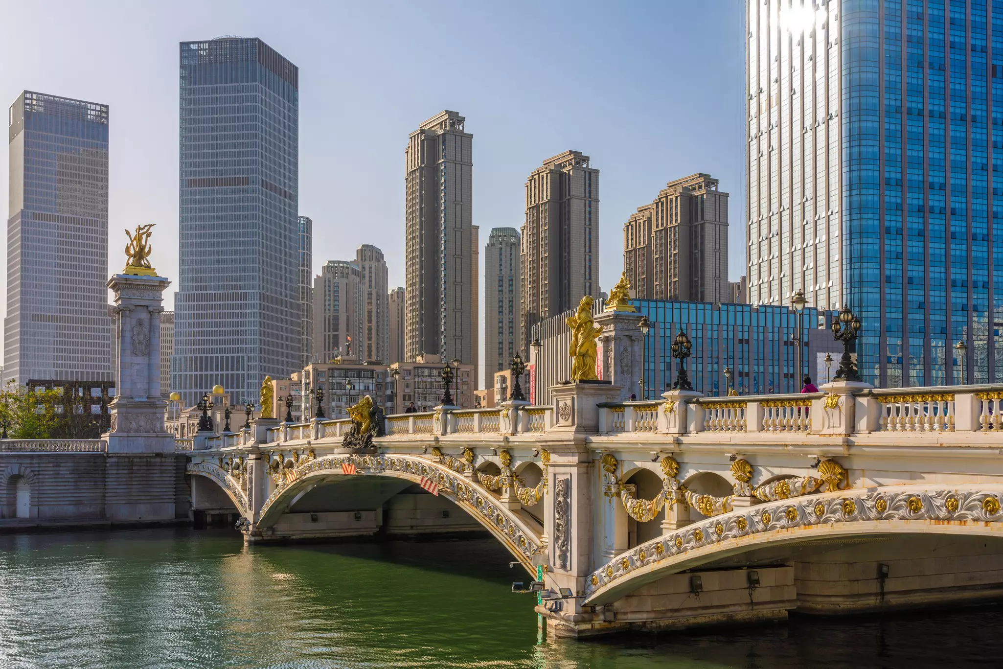 European-style sculptures line the Bei'an Bridge in Tianjin, China.