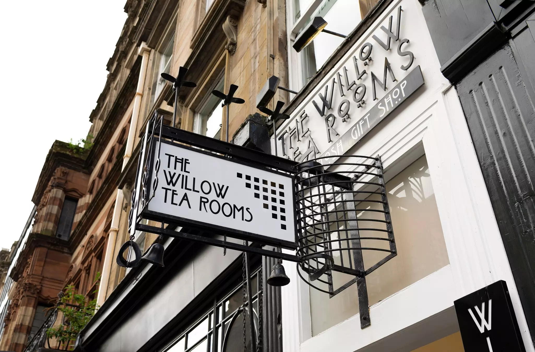 The black-and-white Willow Tea Rooms street sign in Glasgow, Scotland.