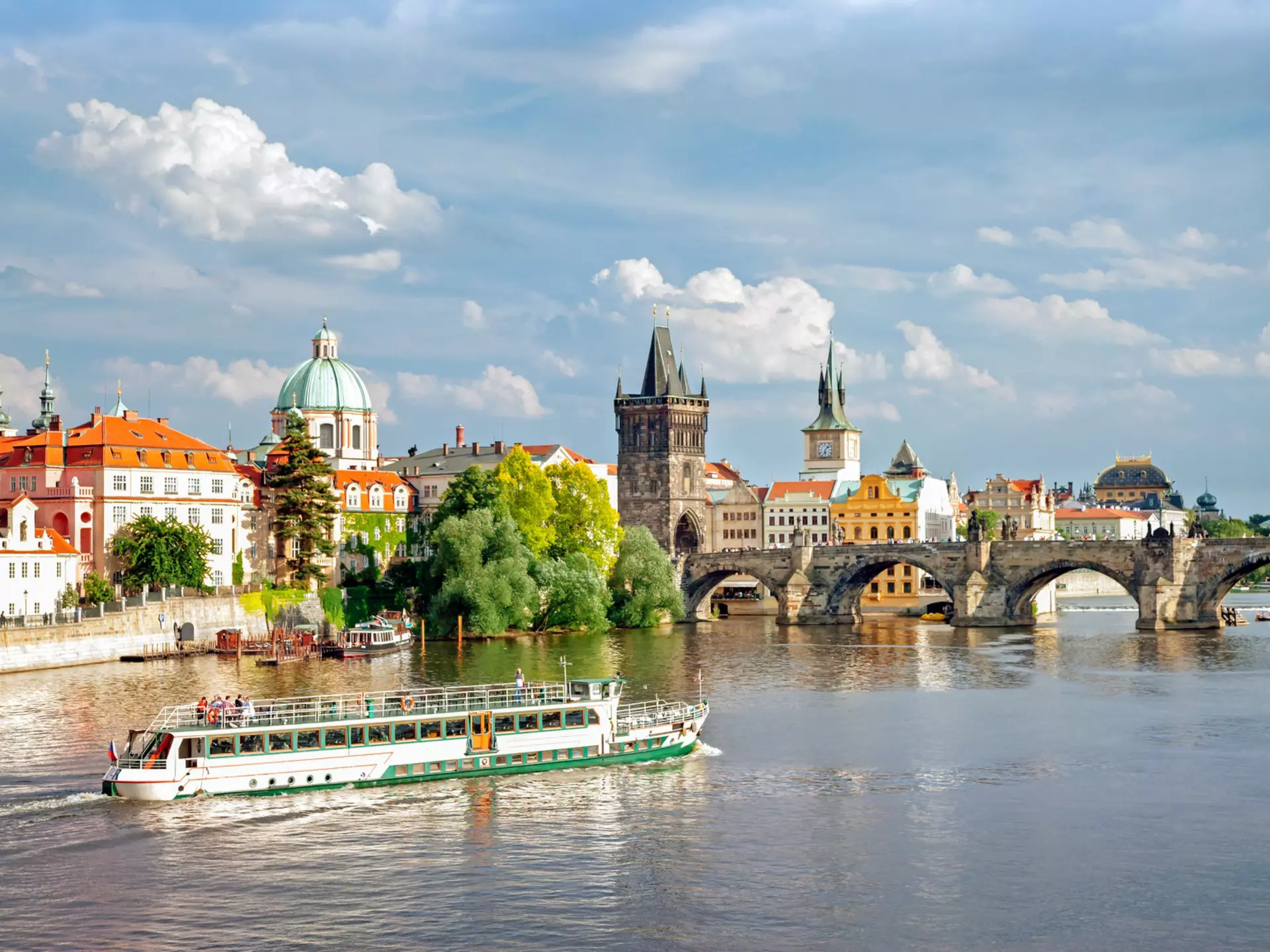 From exploring the city by boat to navigating public transportation, here's how to get around in Prague © Gavin Hellier / Stocksy United