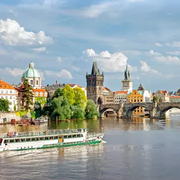 From exploring the city by boat to navigating public transportation, here's how to get around in Prague © Gavin Hellier / Stocksy United