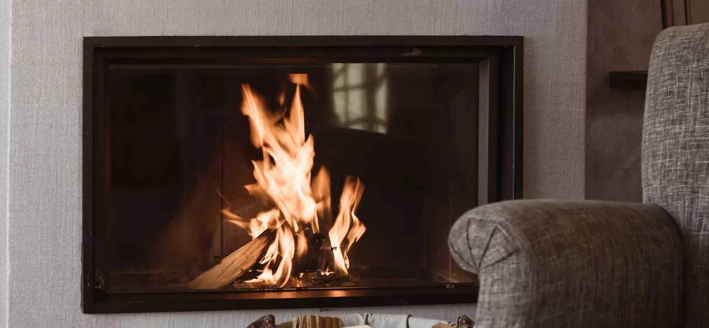 A log fire burning in a hotel room: Valsana Hotel, Switzerland