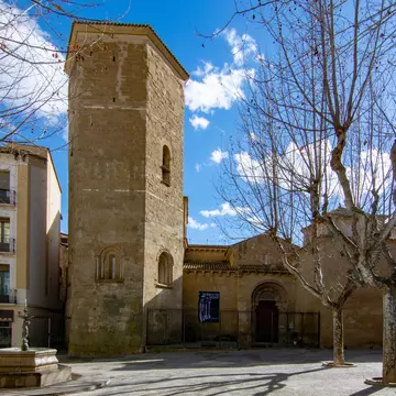 Huesca, Spain; March 2017: view of the bell tower and entrance of the church San Pedro in center historic of Huesca; Shutterstock ID 1358576033;