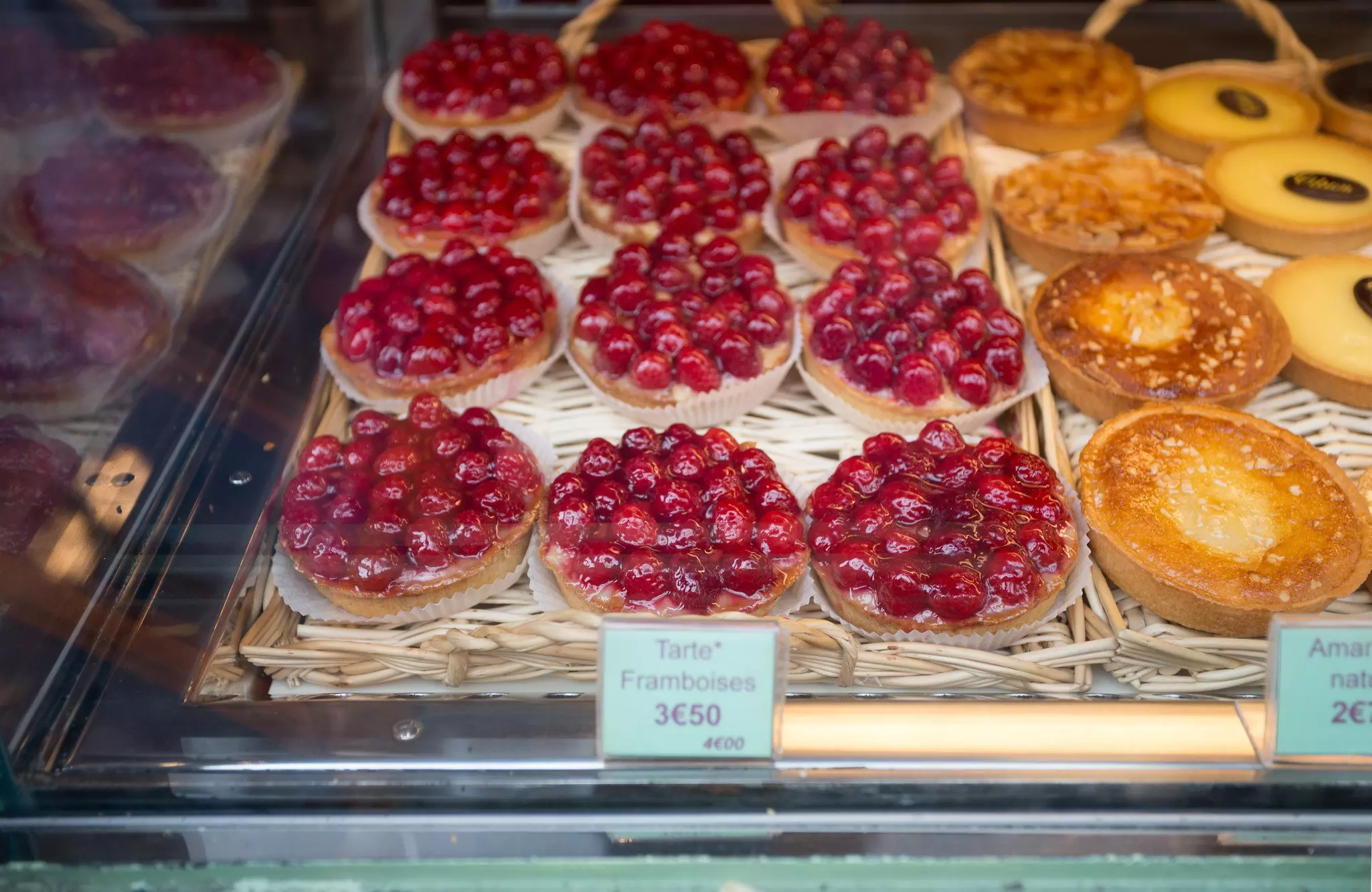Local patiserie in Paris showing the typical french pastries