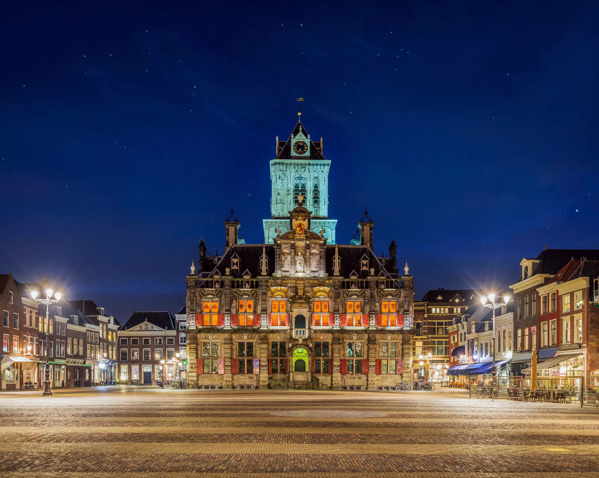 The Delft central square with the old city hall at night