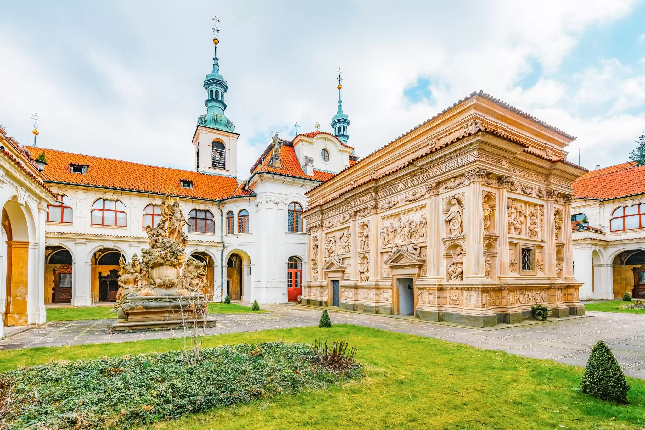 View of the Loreta complex in Prague, Czechia,  with the Santa Casa in the foreground.
