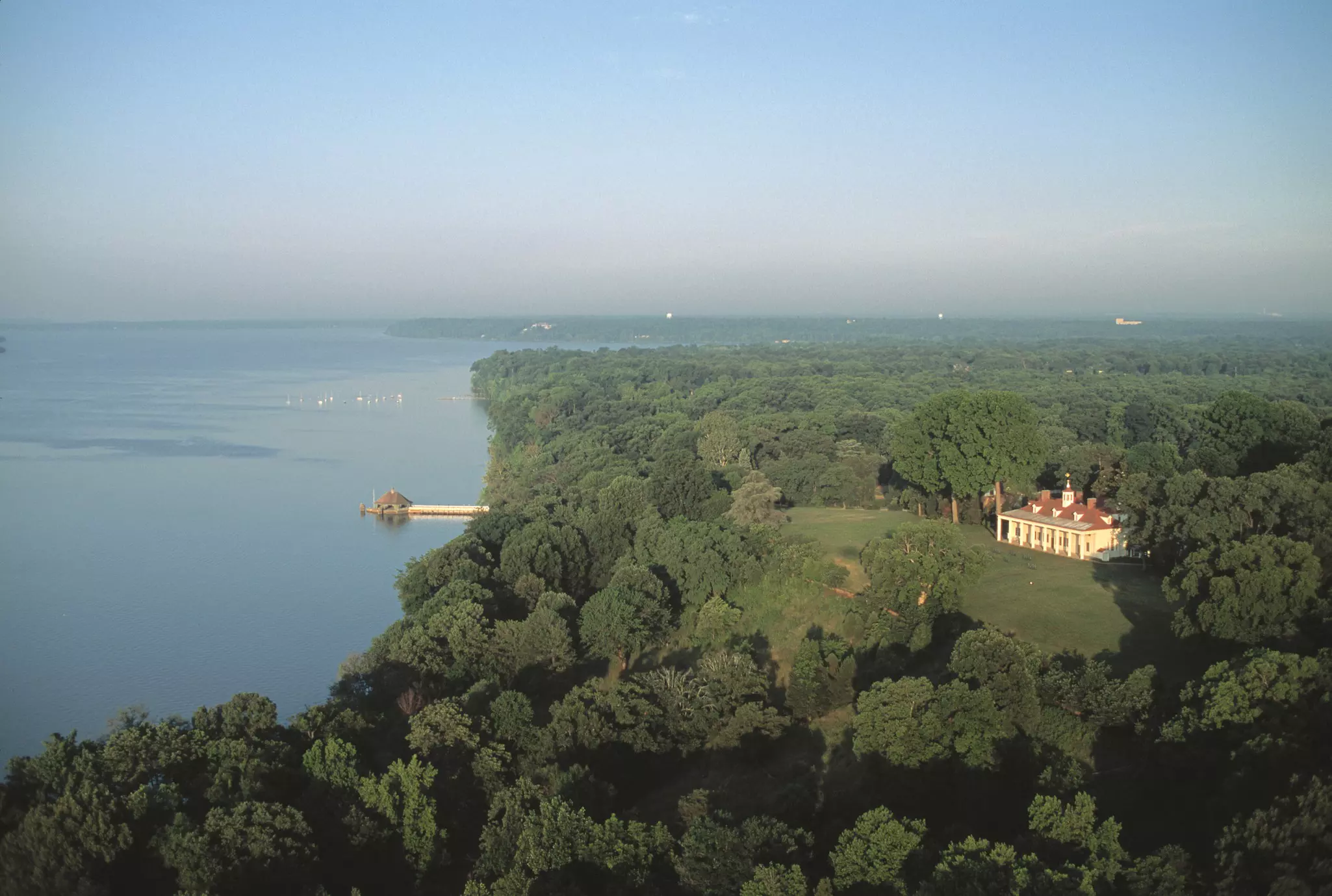 An aerial view of George Washington’s home, Mount Vernon, with woods and Potomac River
