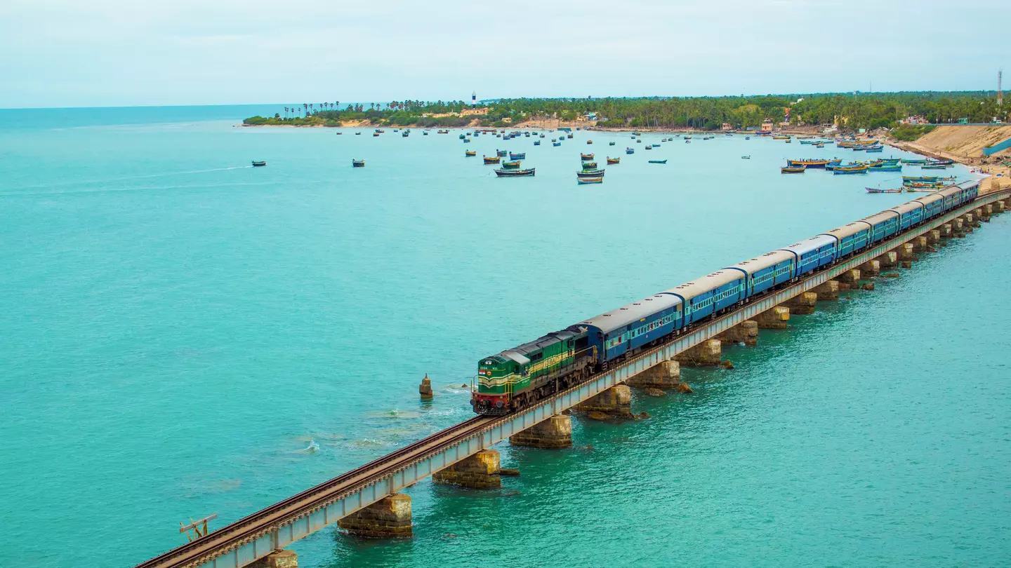 A train crossing the Pamban Bridge in Tamil Nadu, India. Veerababu Achanta/Shutterstock
