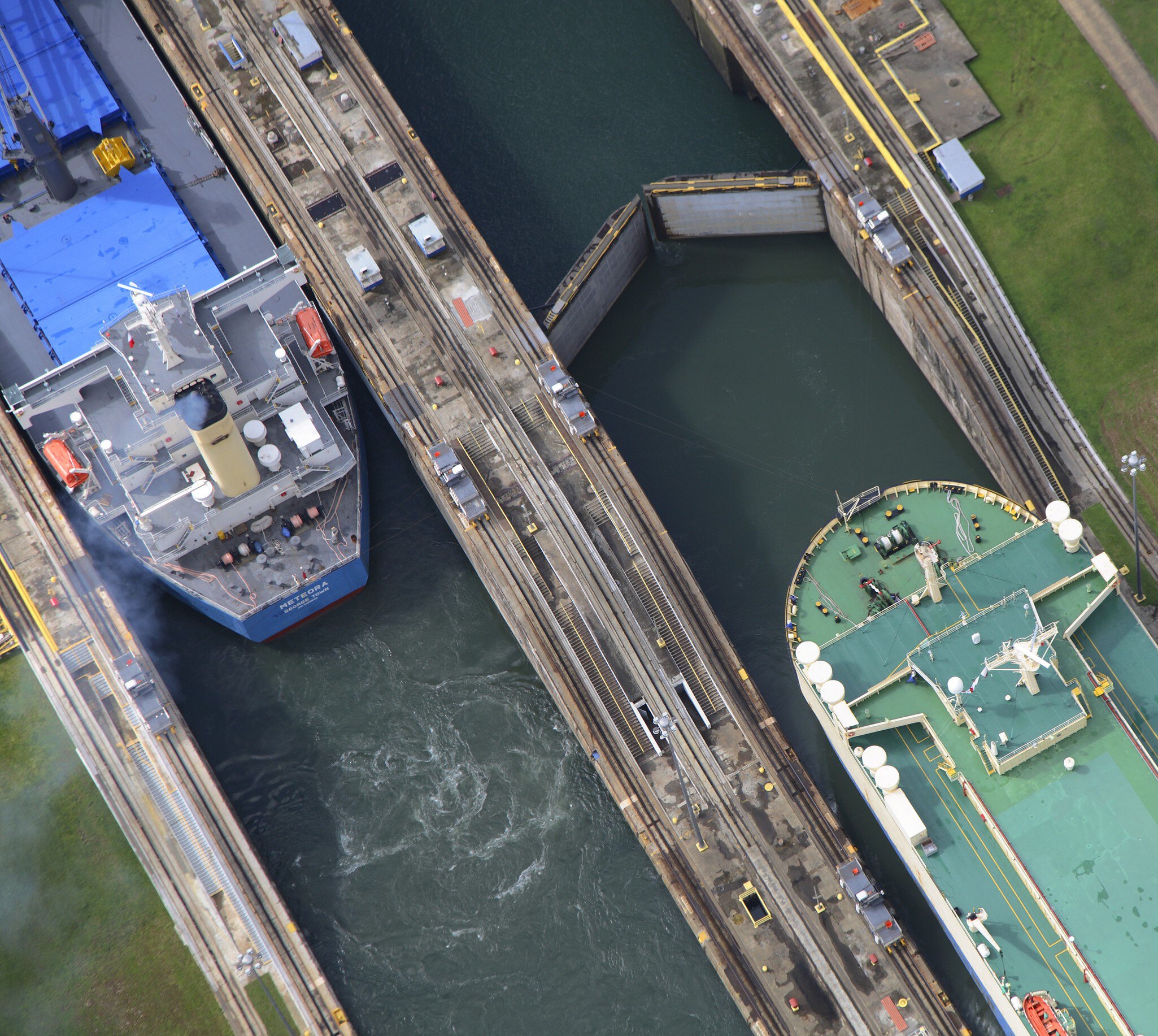 Aerial overlooking two vessels during manoeuvres in Gatun Locks, Panama Canal.