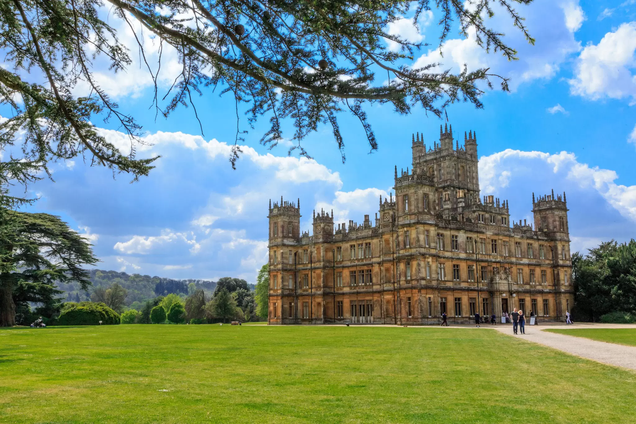 Exterior of Highclere Castle on a sunny day. Emily Marie Wilson/Shutterstock