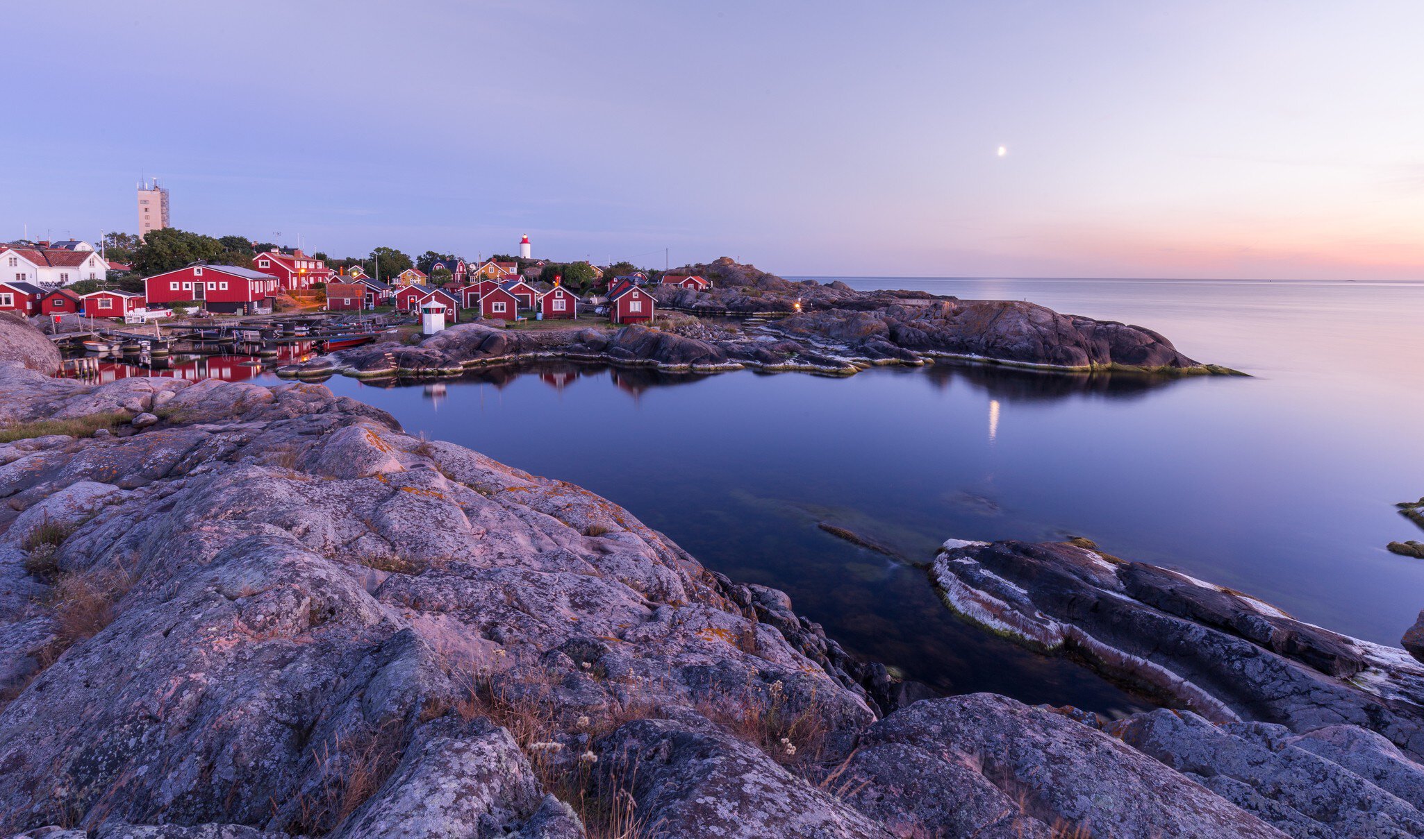 Öja, Nynäshamn, an island in the Stockholm archipelago, Sweden. Landsort is a Swedish village with a lighthouse on the island of Öja...Photo has a pink and purple tone.