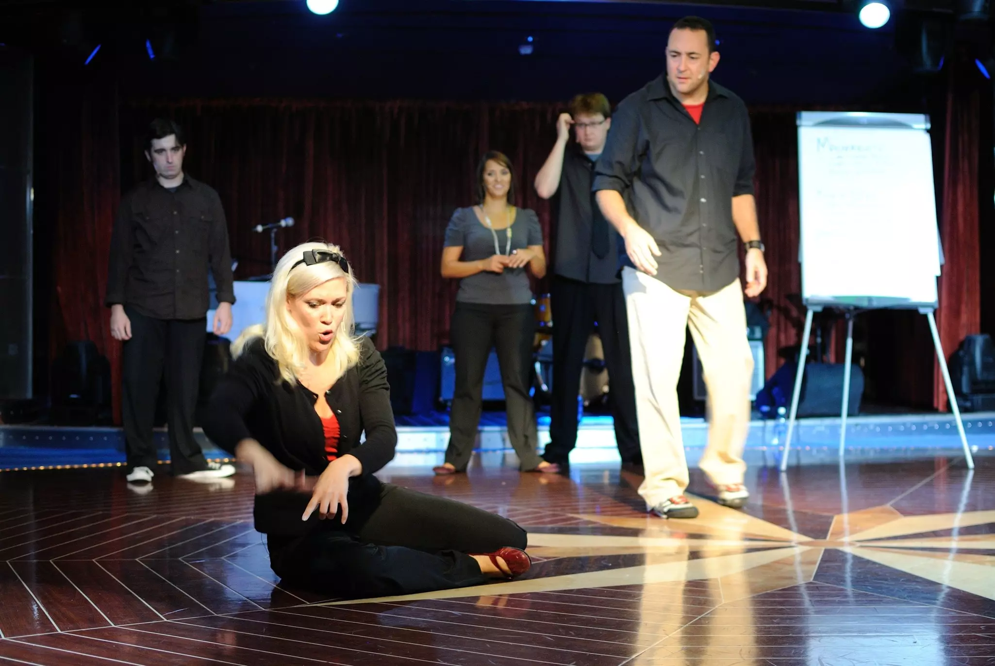 Members of Chicago's famed Second City Comedy Troupe perform January 1, 2010 in the Caribbean aboard the Norwegian Pearl cruise ship.