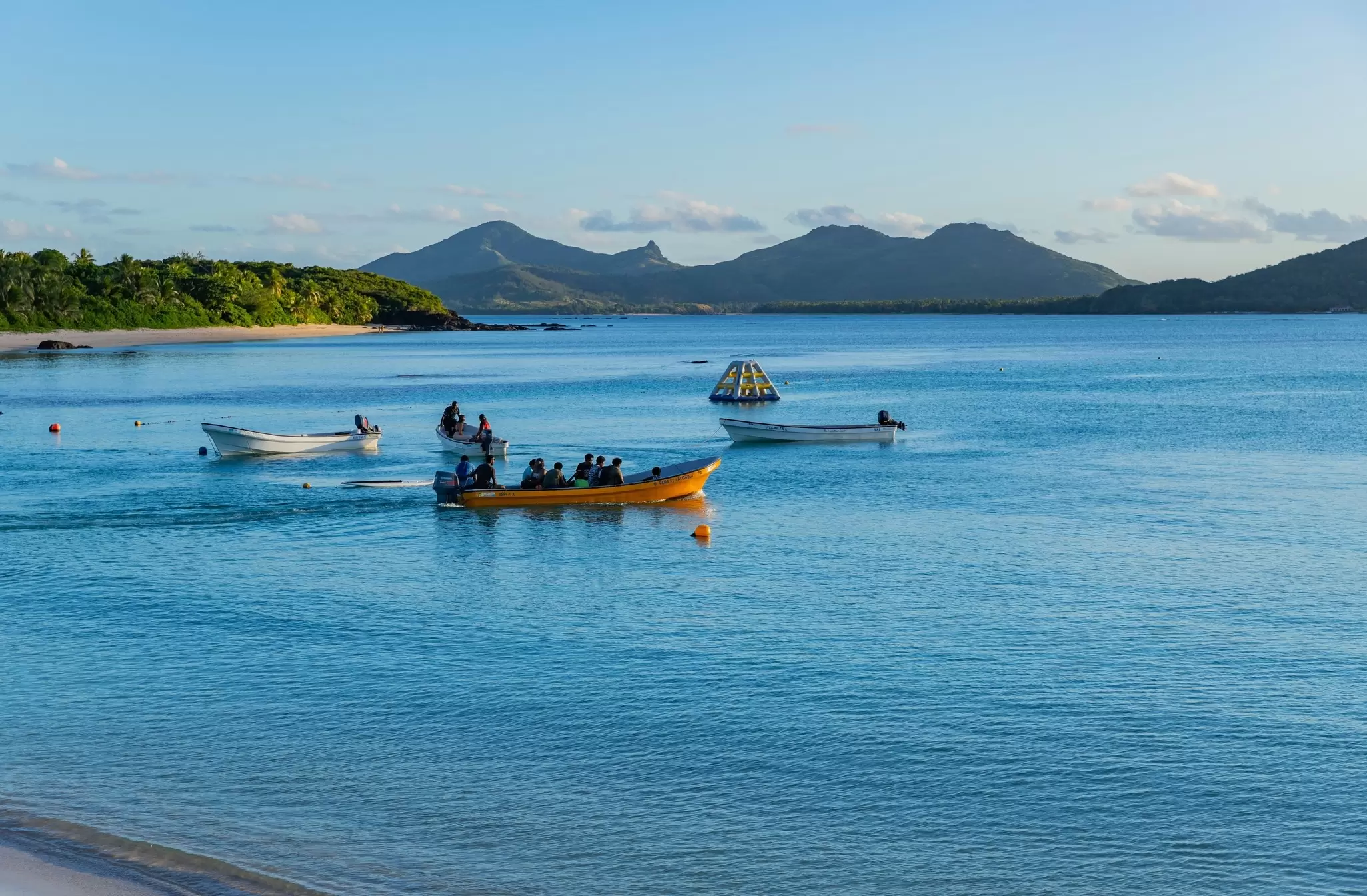 A small boat transporting people between the Yasawa Islands, Fiji. rui vale sousa/Shutterstock