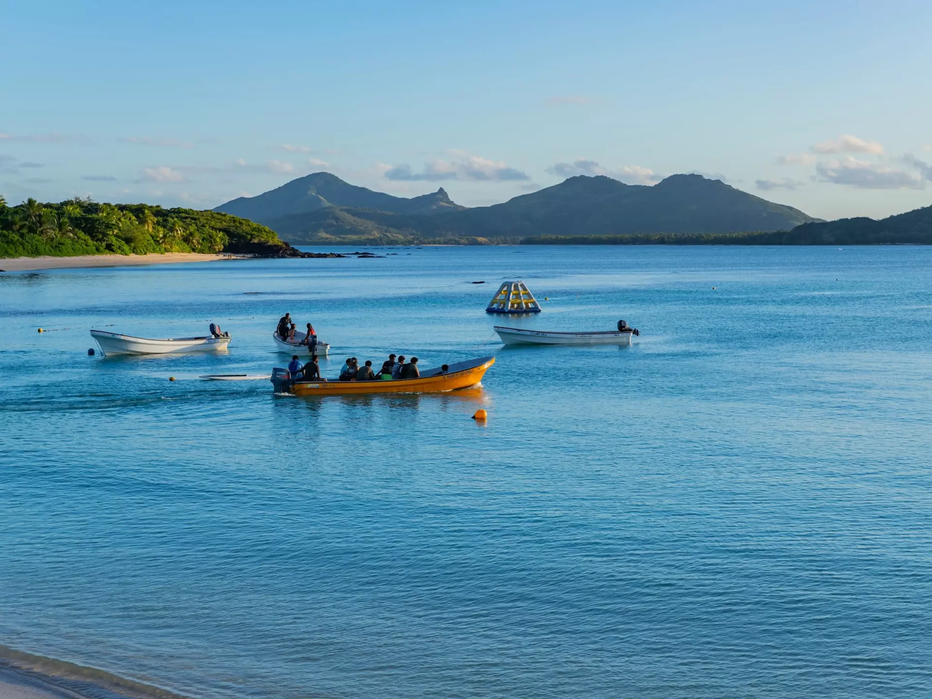 A small boat transporting people between the Yasawa Islands, Fiji. rui vale sousa/Shutterstock