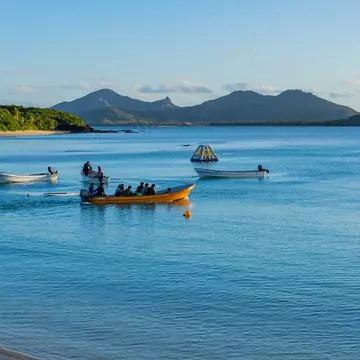 A small boat transporting people between the Yasawa Islands, Fiji. rui vale sousa/Shutterstock
