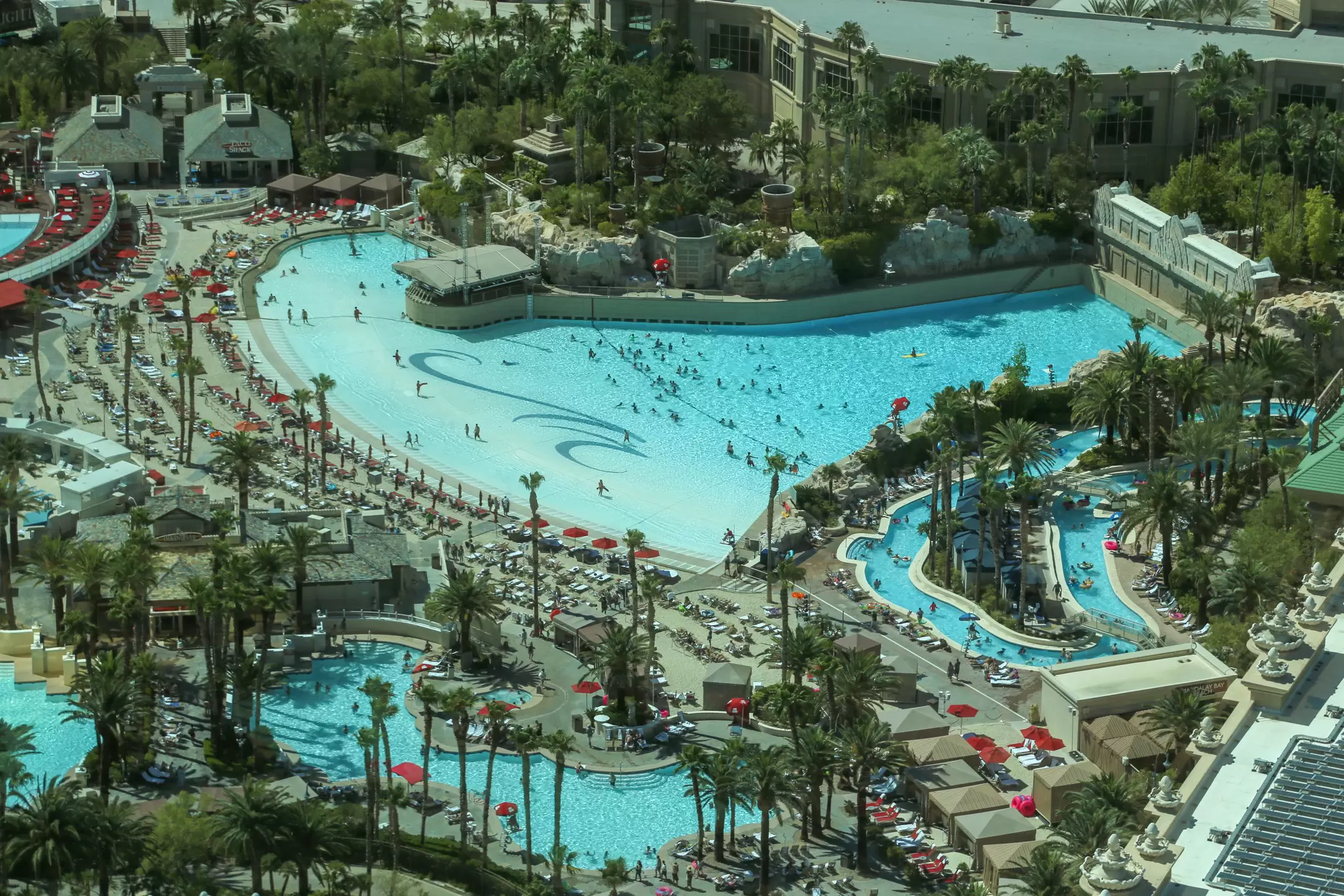Aerial view of the palm-lined pool complex and wave pool at Mandalay Bay, Las Vegas