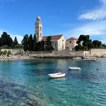 Boats Moored in the Adriatic Sea Cove in front of the Franciscan Monastery and Church of Our Lady of Mercy, Hvar Croatia May 7th 2024, License Type: media, Download Time: 2026-02-23T00:05:59.000Z, User: LP_YKhanna, Editorial: true, purchase_order: 65050 - Digital Destinations and Articles, job: LP, client: App Content, other: Yuvraj Khanna