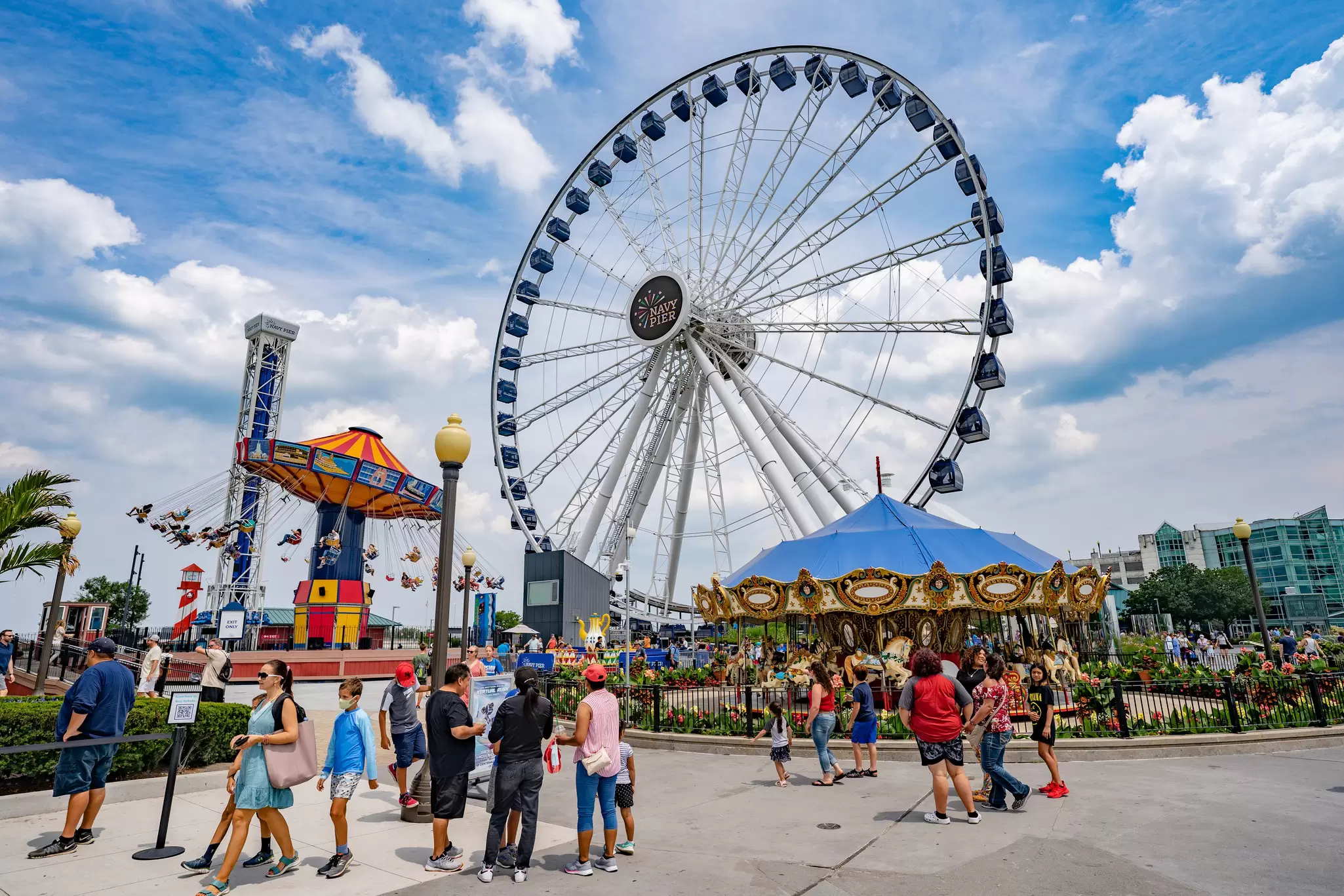 Chicago, Illinois, USA - August, 13, 2021: Navy Pier Park attractions on blue sky background during summer season. , License Type: media, Download Time: 2024-09-06T11:55:49.000Z, User: comptonsheldon109, Editorial: true, purchase_order: 56530, job: Global Publishing WIP, client: Pocket Chicago 6, other: Compton Sheldon