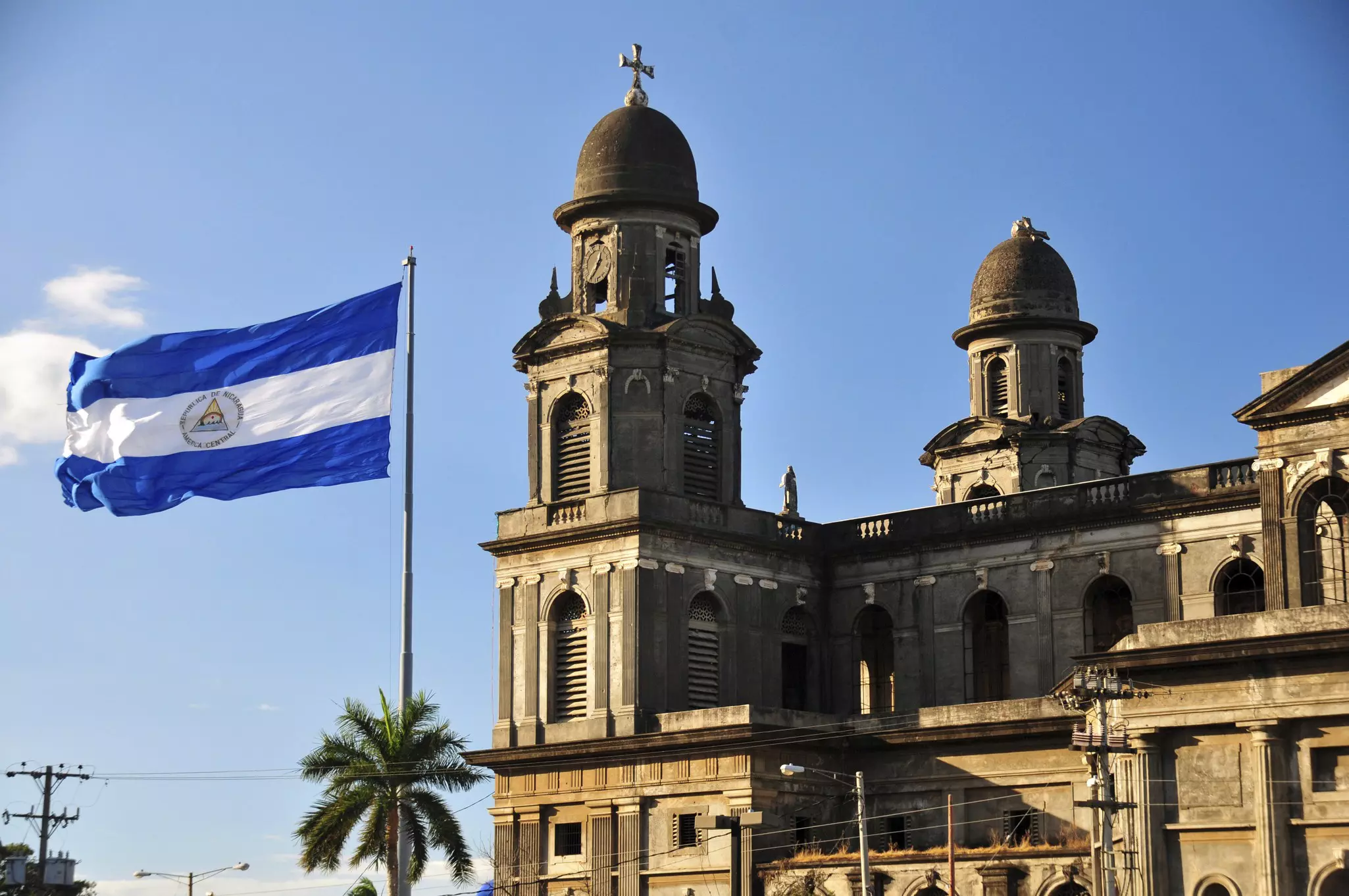 Managua, Nicaragua:  Old Cathedral and Nicaraguan flag