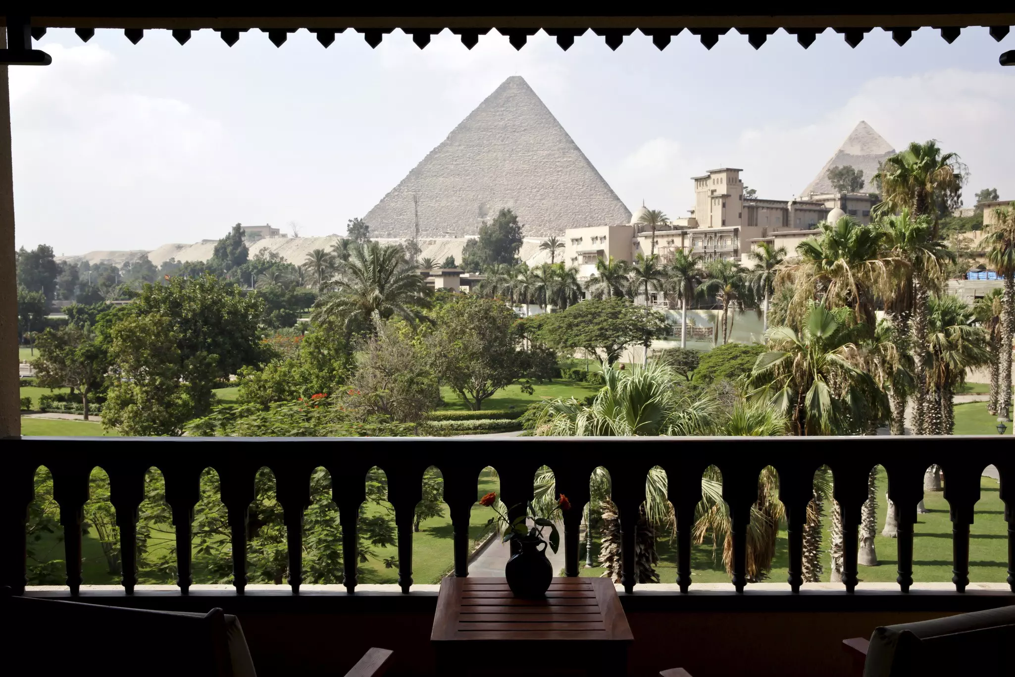 The ancient pyramids of Giza seen from a hotel room beyond the gardens of the Mena House hotel in Cairo © Shawn Baldwin/Bloomberg via Getty Images