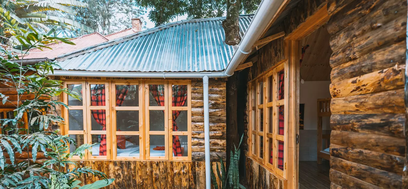 The exterior of a wooden cabin.