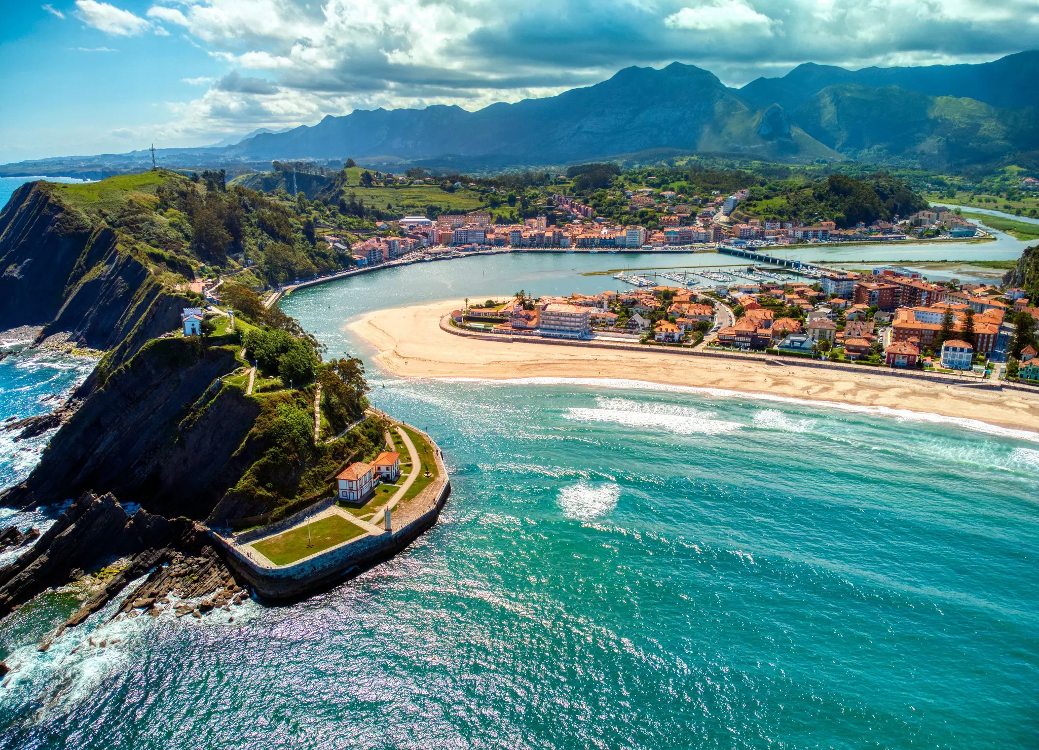 Golden sands and to-die-for seafood await in Ribadesella in Asturias, easily reached by train © StockPhotoAstur / Shutterstock