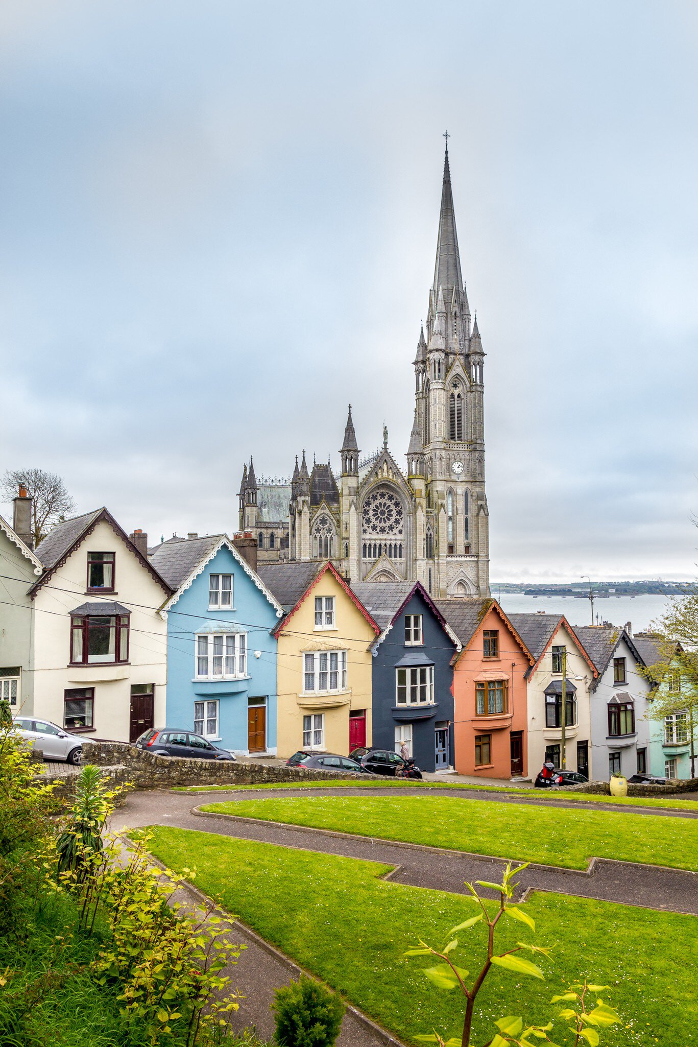 St Colman's Cathedral  and colored houses in Cobh, Ireland.