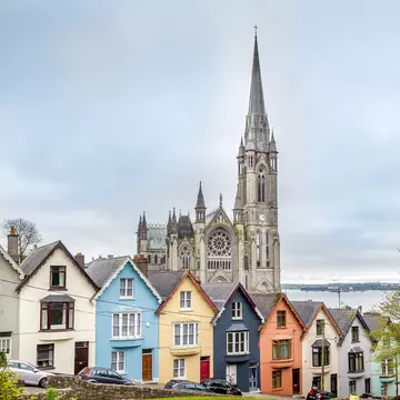 St Colman's Cathedral  and colored houses in Cobh, Ireland.