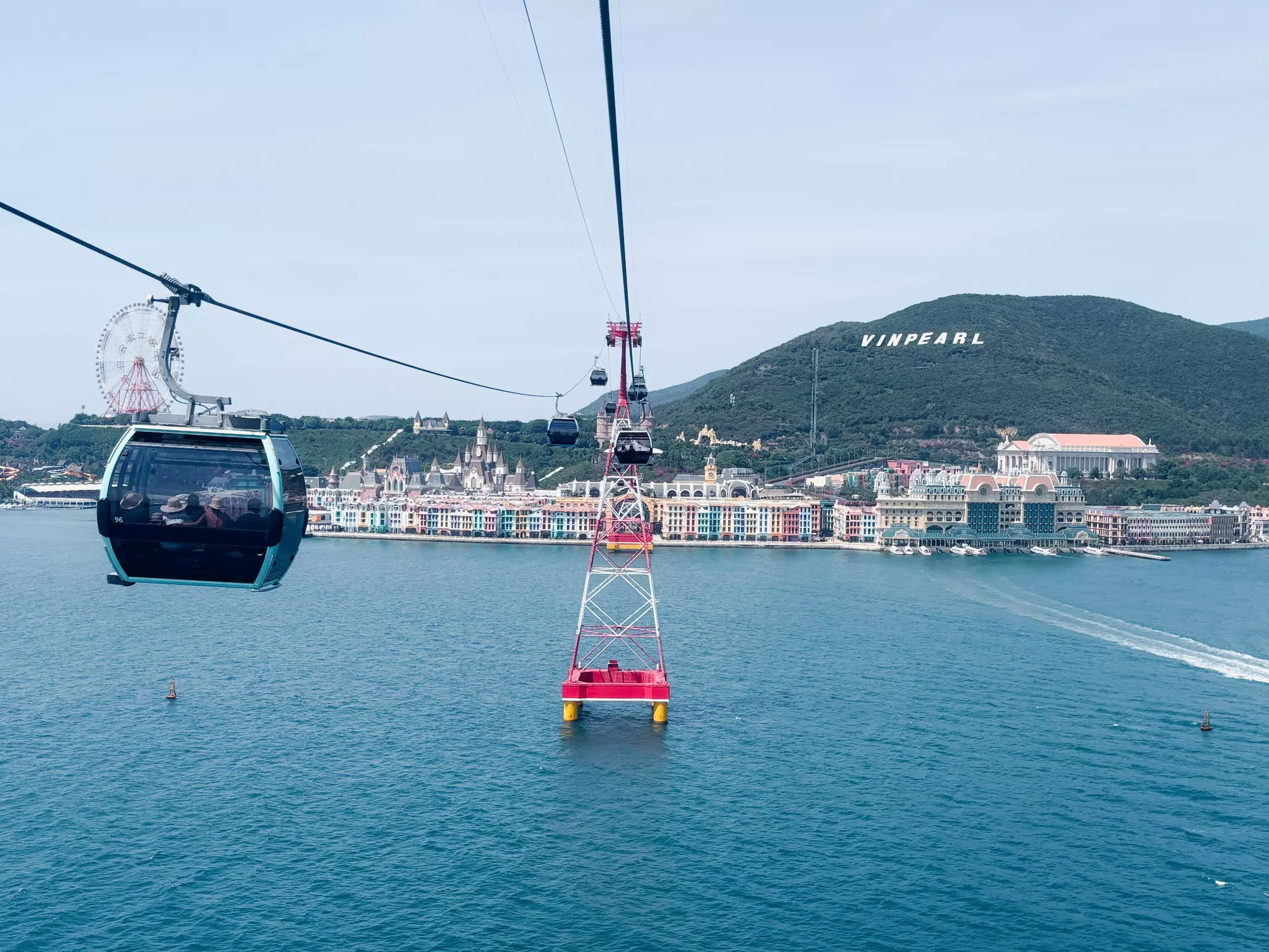 Cable car over water going toward an island