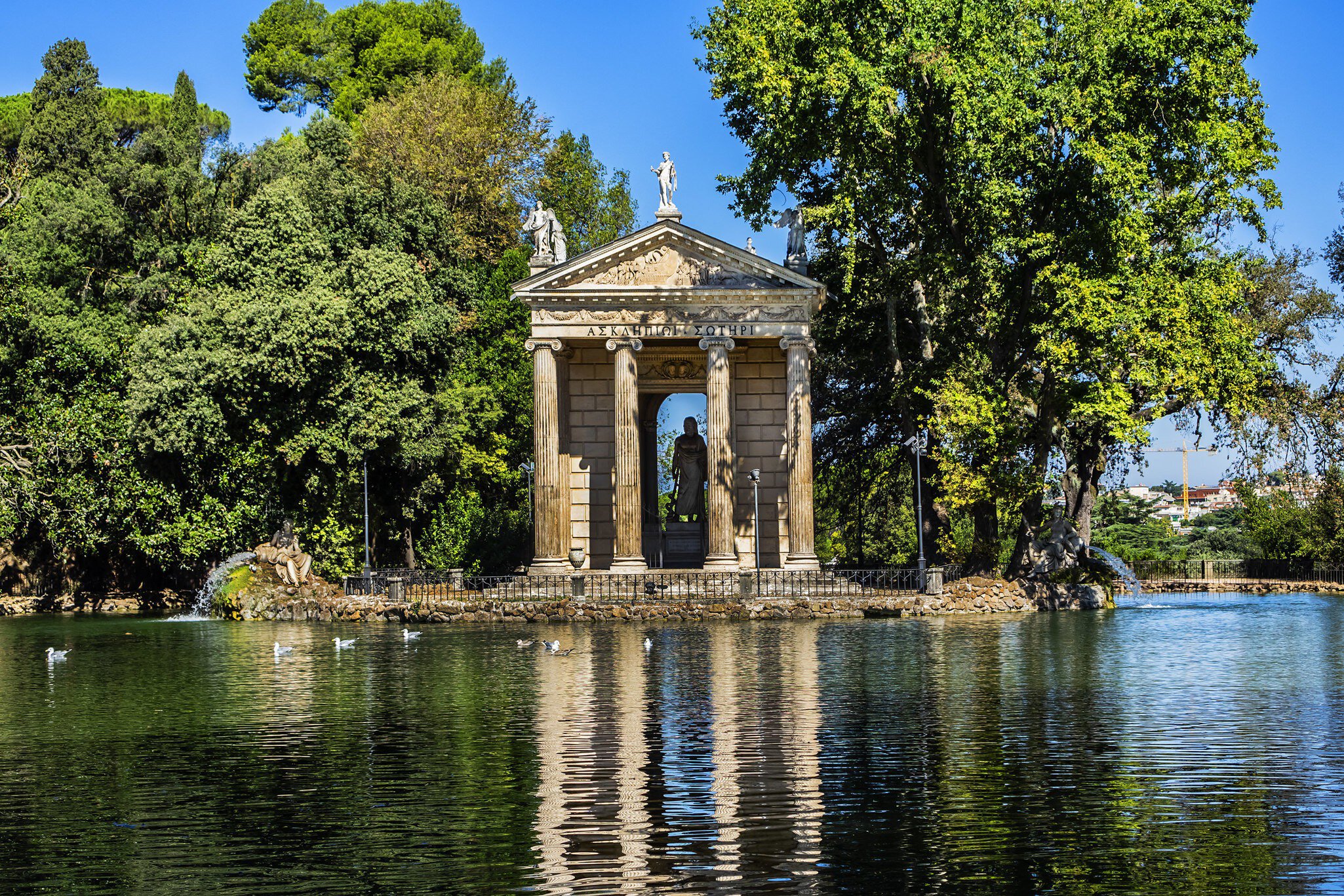 The lakeside Temple of Aesculapius in the gardens of Villa Borghese, Rome