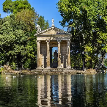 The lakeside Temple of Aesculapius in the gardens of Villa Borghese, Rome