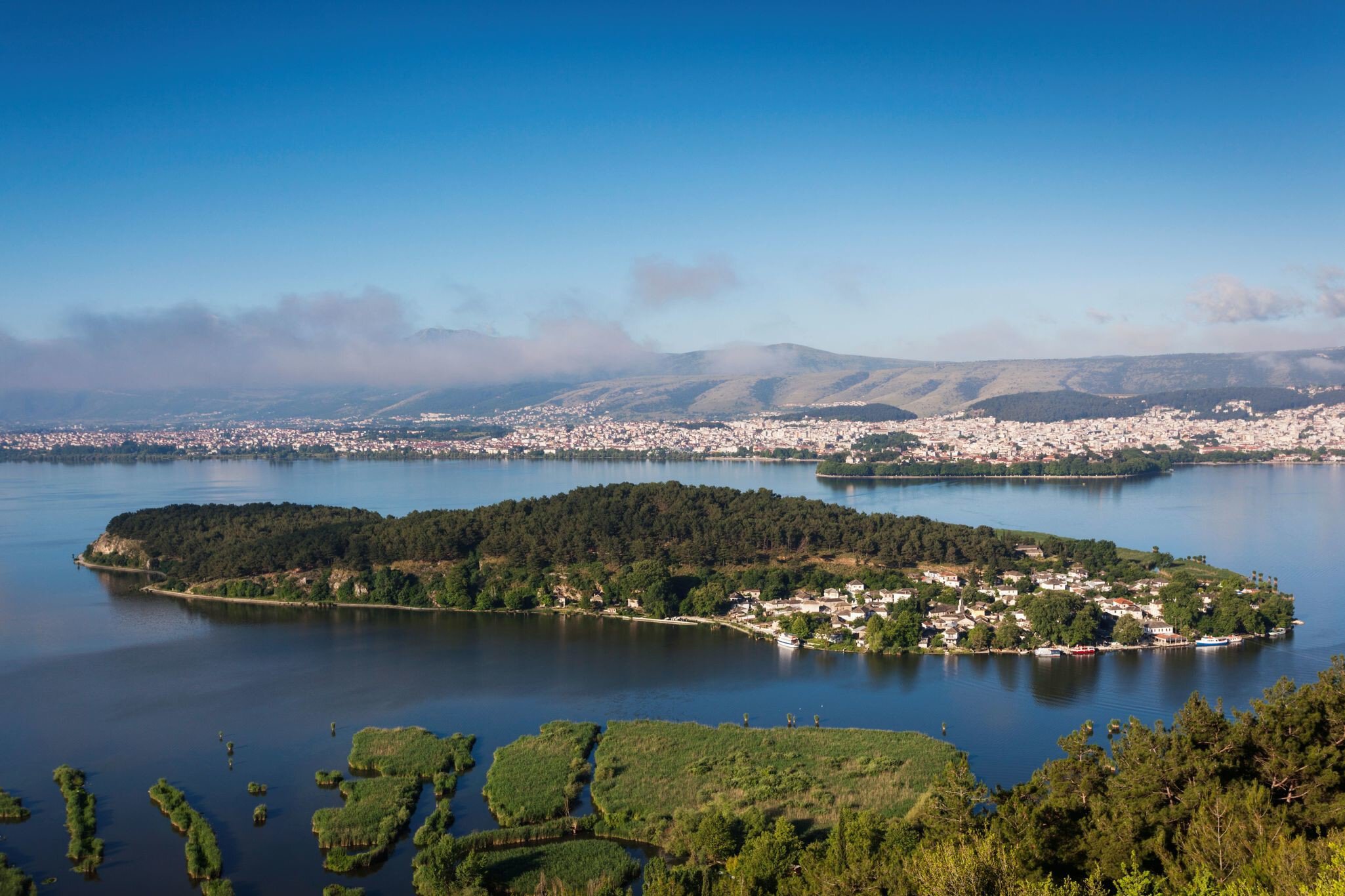 Greece, Epirus Region, Ioannina, elevated city view, Lake Pamvotis and Nisi Island.