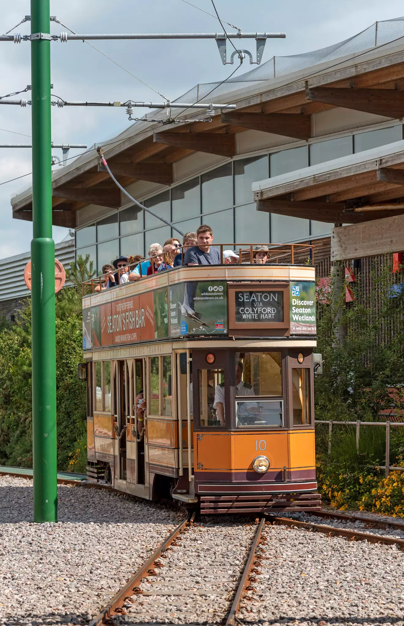 Passengers on the Seaton Tramway in Devon, England.