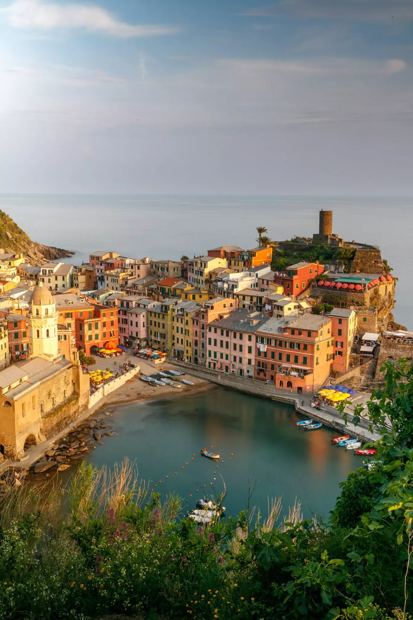 Aerial view of a Cinque Terre town with typical pastel buildings overlooking the sea