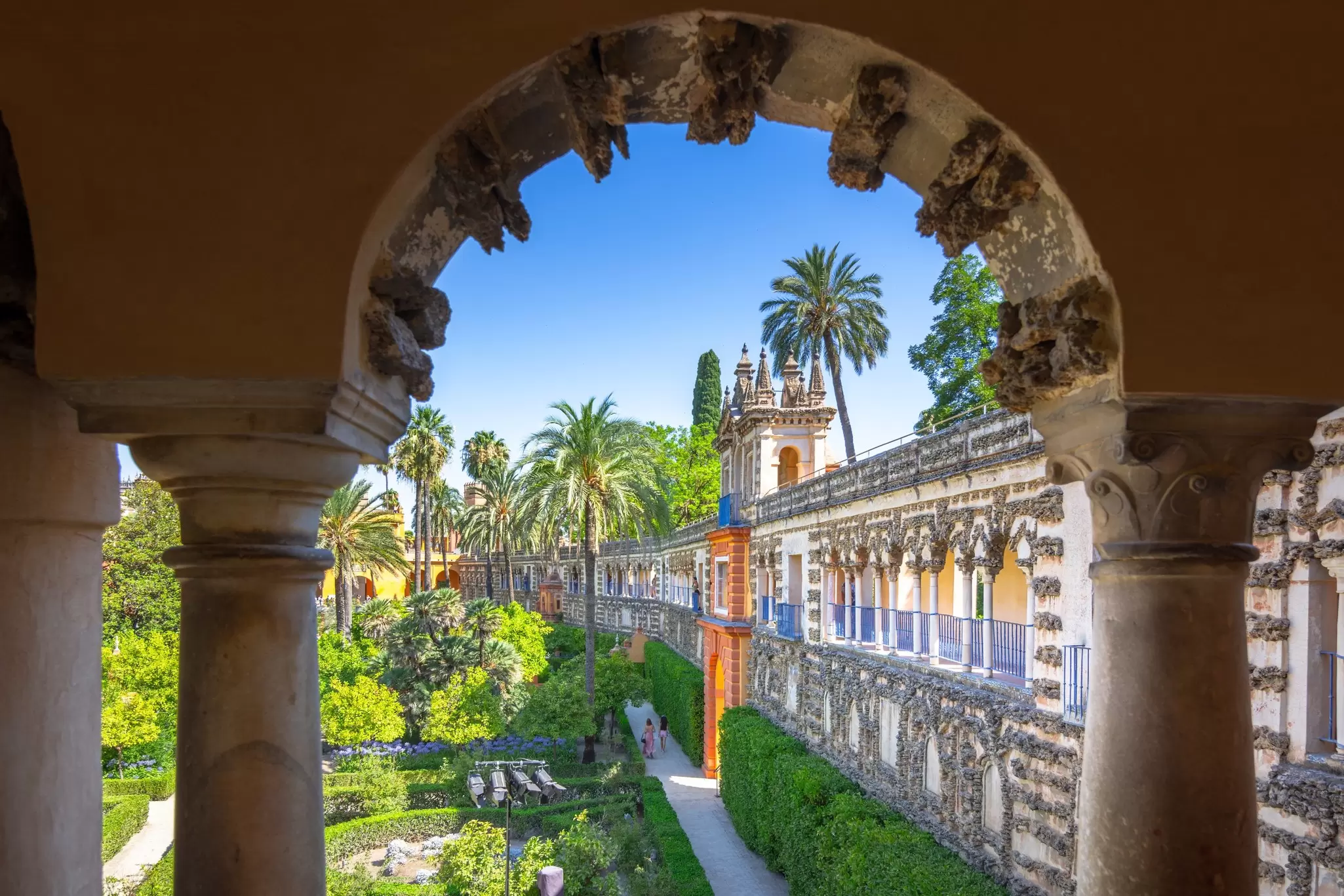 View of the Real Alcázar Gardens in Seville, Spain.