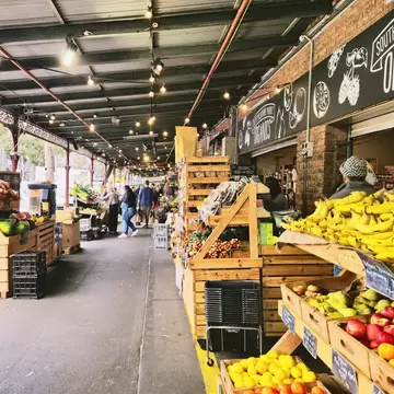 Fruit vendors at South Melbourne market. Melbourne, Australia.