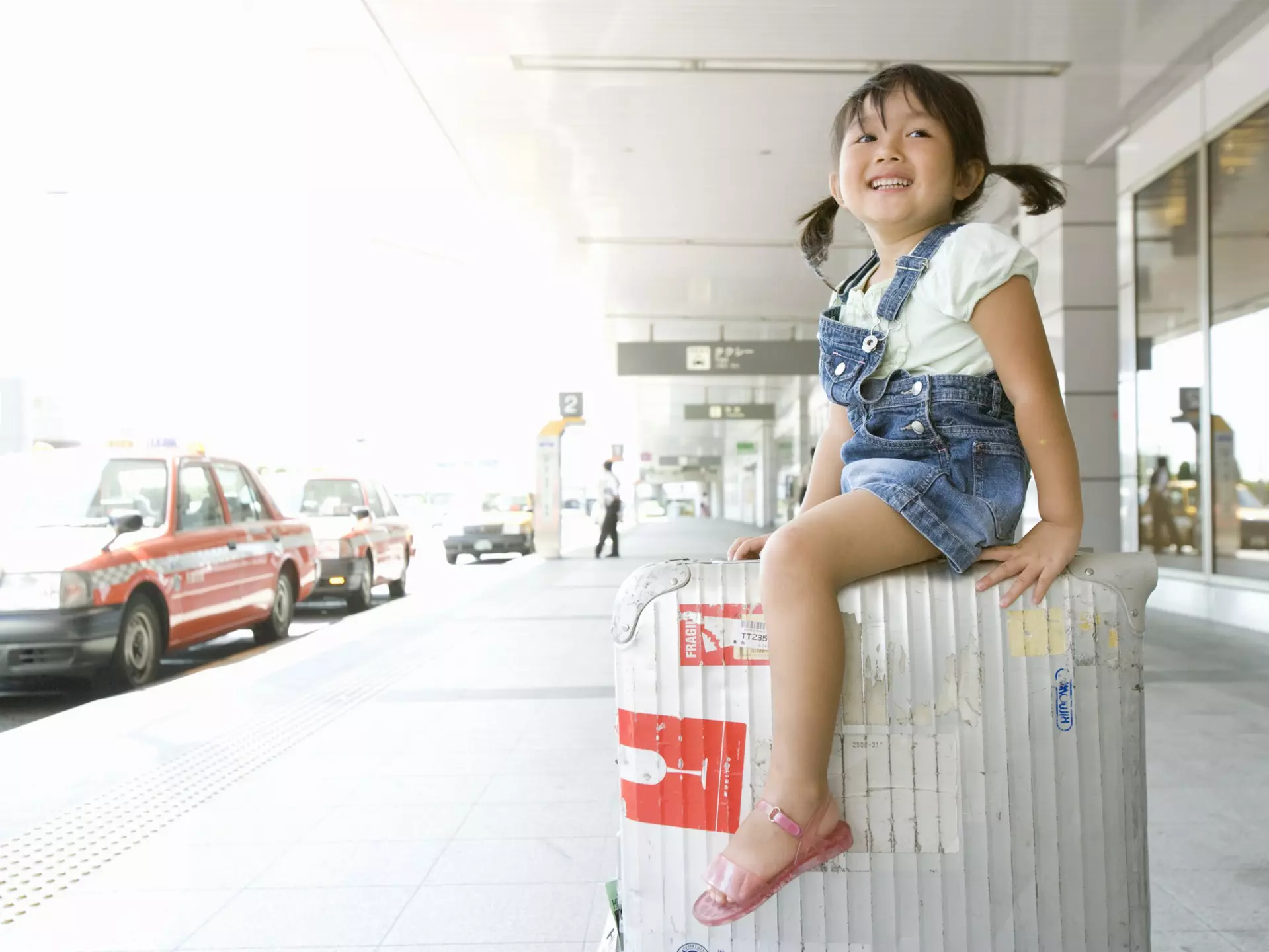 People Casual Clothing Anticipation Excitement Satisfaction Enjoyment Exhilaration Horizontal Full Length Outdoors 2-3 Years Suitcase Hairstyle Black Hair Japan Sitting Playful Airport Day Childhood Curiosity One Person Pigtails One Girl Only Building Exterior Photography Travel Children Only Kagawa Only Japanese Takamatsu
A girl rides suitcase by cabstand in airport