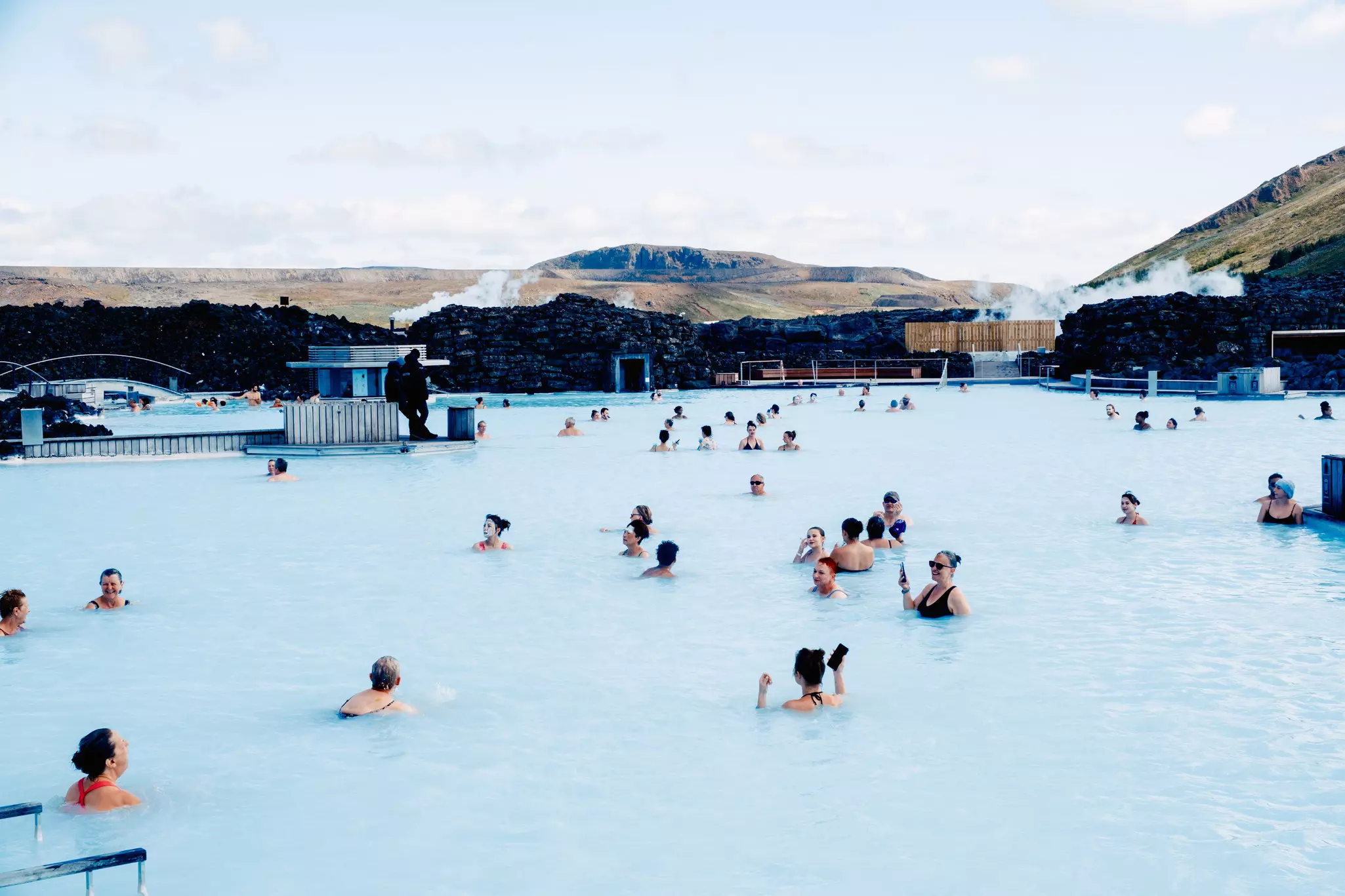 People bathing in the Blue Lagoon near Keflavík, Iceland.
