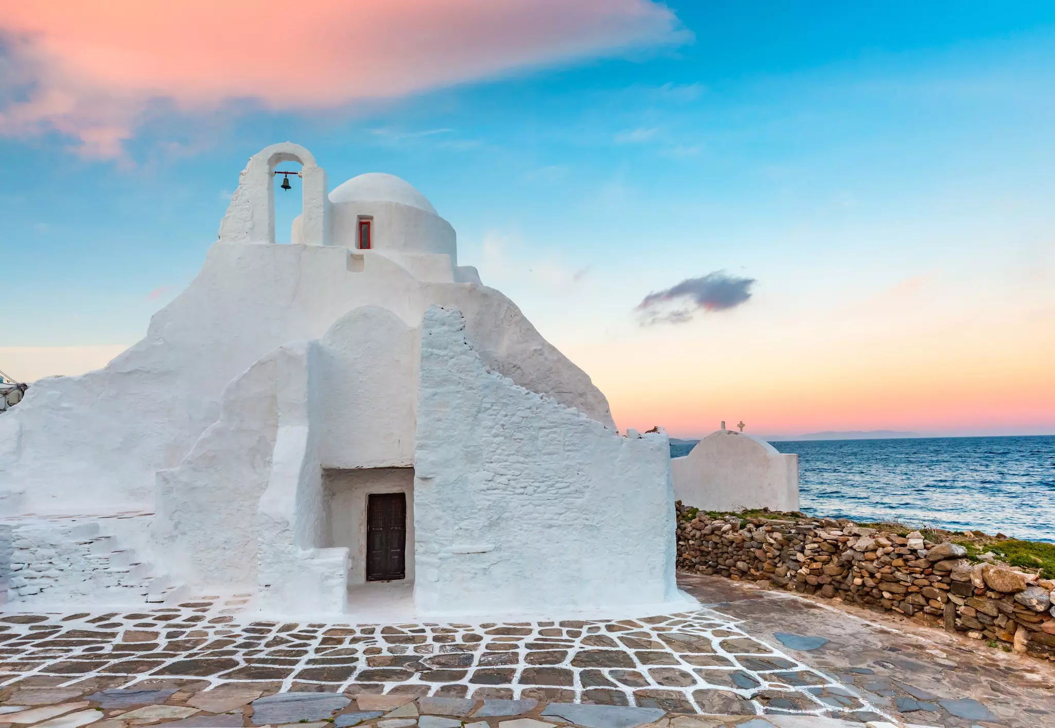 Church of Panagia Paraportiani at sunrise, the most famous architectural structures in Greece, on the island Mykonos, The island of the winds, Greece