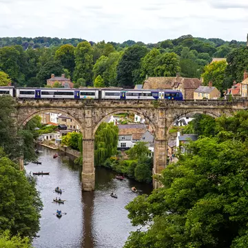 A train crossing the Knaresborough Viaduct in Yorkshire. chrisdorney/Getty Images