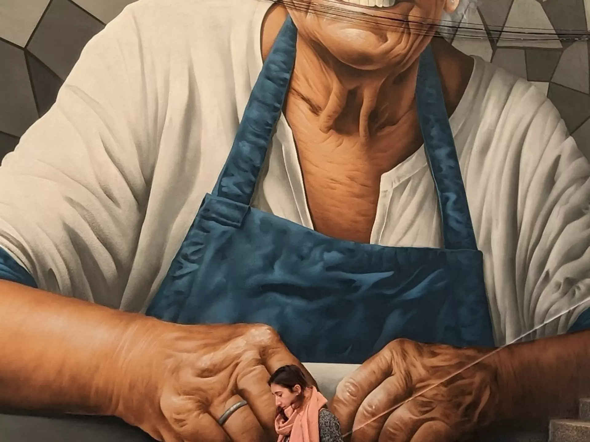 A large mural depicts Woody Guthrie and the phrase 'This land is your land' on the side of the center. USA museums for music lovers