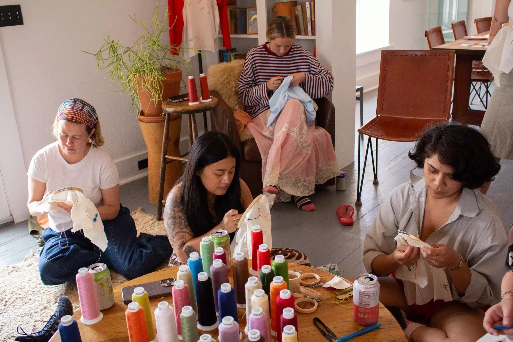 Women doing embroidery.