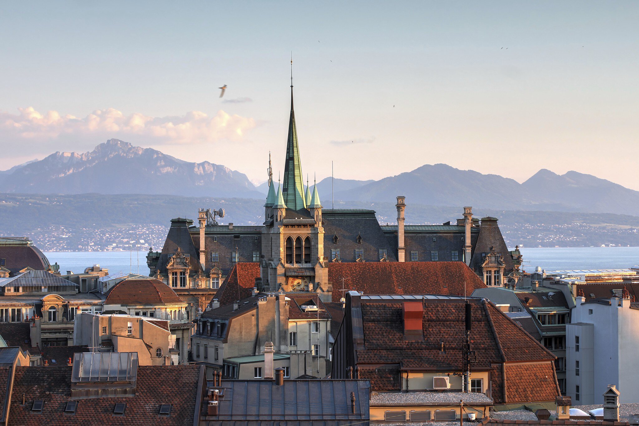 Skyline of Lausanne, Switzerland as seen from the Cathedral hill at sunset zoomed-in on the tower of St-Francois Church. Lake Leman (Lake Geneva) and the French Alps provide a beautiful background.
Lausanne, Switzerland
lausanne, switzerland, swiss, skyline, golden hour, day, sunset, st francoise, church, spire, palace, tower, architecture, vaud, view, alps, french alps, european alps, lake leman, lake geneva, lake, water, mountain range, mountain, peaks, summer, beautiful, europe, city, urban, development, old
CLEARED FOR DIGITAL USE ONLY -